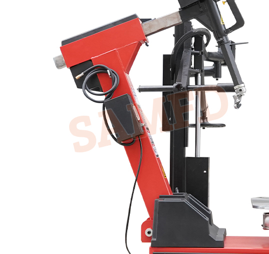 BACKWARD TILTING AUXILIARY ARM